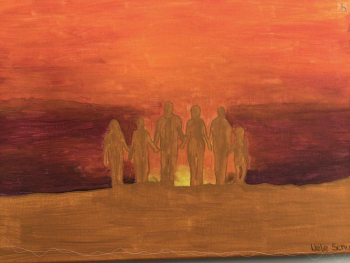 Menschengruppe im Sonnenuntergang